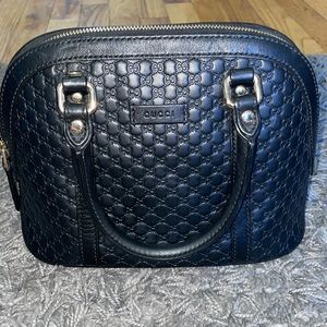 Gucci cross body / hand bag. No damages. Used only about 3/4 times.
